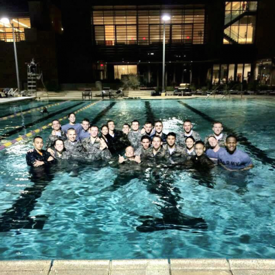 Cadets in swimming pool posing after exercise